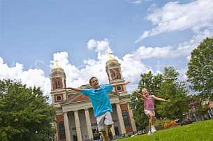 Kids in Cathedral Square - Fun Flying Airplane