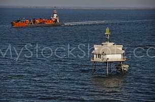 Ship passing Middle Bay Light