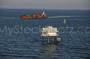 Ship passing Middle Bay Light