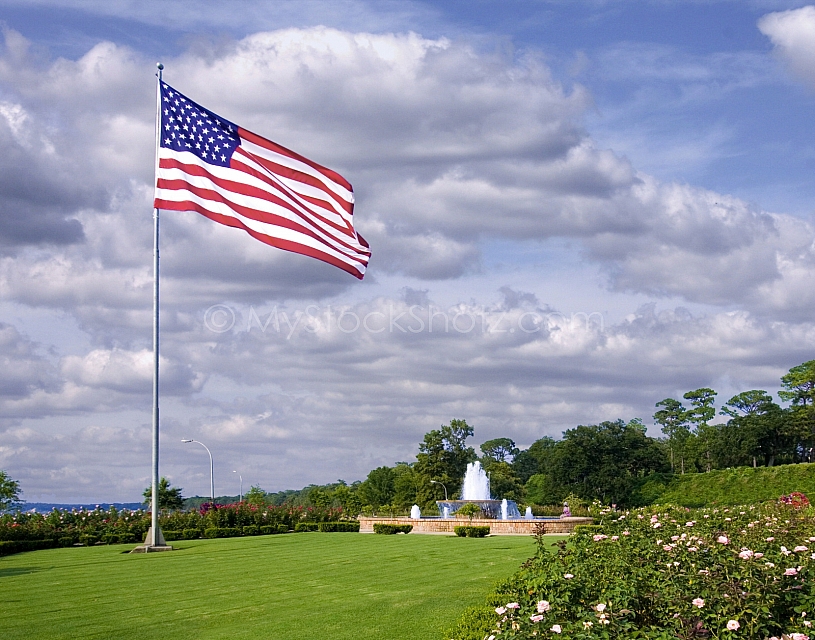 Flag flying in the Rose Garden at the Fairhope Pier