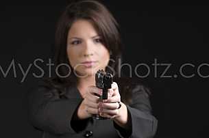 Woman with hand gun